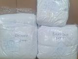 several rolls of toilet paper stacked on top of each other in a box