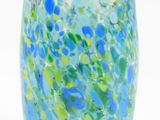 a glass vase with a blue and green design on it