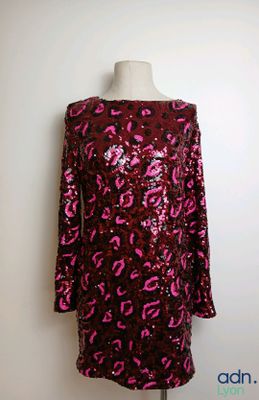 pink and black sequinned dress on a mannequin mannequin mannequin mannequin mannequin mannequin mannequin manne