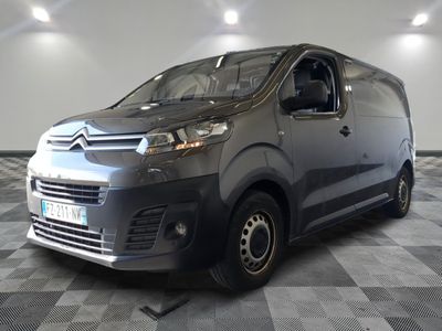citroen van parked in a showroom with checkered floor