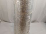 a roll of yarn wrapped in plastic on a white surface