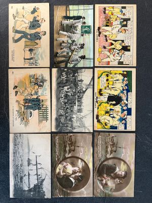 a lot of old comic books on display on a table