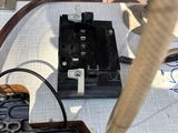 a close up of a sewing machine on a table