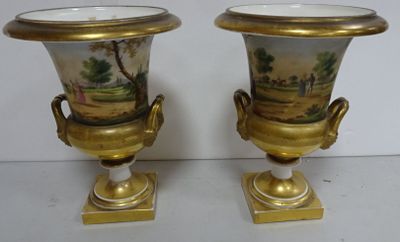 two vases that have been painted with a landscape on them