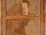 a shadow of a man on a window sill