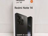 the box of the redmi note 14 is open on the table