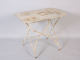 an image of a small table with a white top and legs