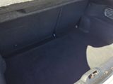 a trunk of a car with the back seat folded down