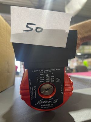 an image of a close up of a red valve on a table