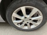 a close up of a tire on a car ' s rim