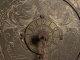 an old clock with roman numerals on it