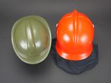 two helmets that are sitting next to each other
