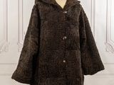 a woman ' s coat on a mannequin mannequin mannequin mannequin mannequin mannequin mannequin mannequin mann