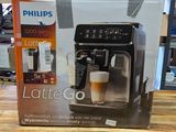a coffee machine sitting on a wooden table in a store