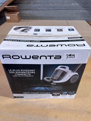 la boîte d'un aspirateur est posée sur une table