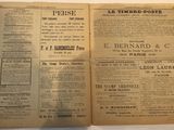 two pages of old newspaper on a table