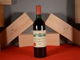 a bottle of wine that is sitting on a table