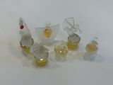 a lot of small pieces of glass sitting on a table