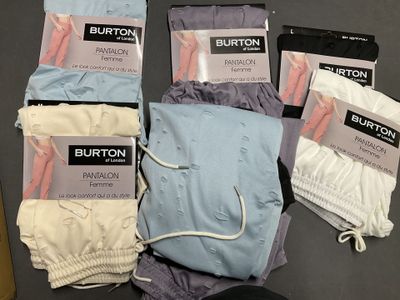 several pairs of men ' s underwear are laid out on a table