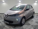 an image of a silver car in a showroom