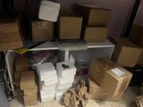 a lot of boxes that are stacked on a shelf