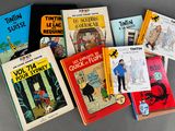 many children ' s books that are on the table