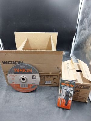 a box of tools sitting on the floor next to a box of tools