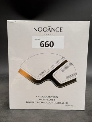the box of the noorance hair trimmer is open and ready to be used
