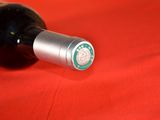 a bottle of wine that is sitting on a table