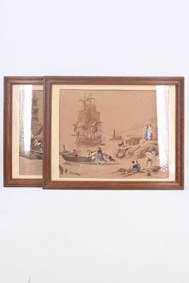 deux tableaux encadrés accrochés au mur d'une pièce