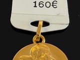 a close up of a medal with a tag attached to it