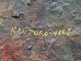 a graffiti on the wall of a building that says kartor one