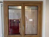 a small window in the corner of a room