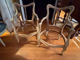 two chairs that are sitting on the floor in the room