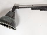 a light that is on the wall next to a lamp