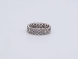 an image of a diamond ring on a white surface