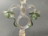 an image of a glass candle holder with a snake on it