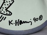 a white plate with a black and white drawing on it