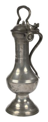 a silver vase with a handle on a white background