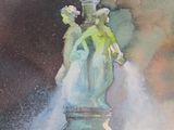 a water fountain with a statue on top of it