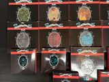 many different types of brooches displayed on a table