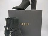 Bottines Gucci à talons, avec chaîne et boucles