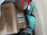 a cardboard box full of assorted items in a room