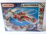 boxed box of meccan multimodels with a helicopter and vehicles