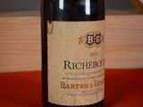a bottle of wine that is sitting on a table