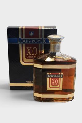 the bottle of louis royer xo is next to a box