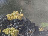 a painting of grapes in a basket on a table