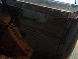 a machine that is sitting on a pallet next to a banana