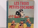 un vieux livre pour enfants avec une illustration représentant un chien et d'autres personnages de dessins animés