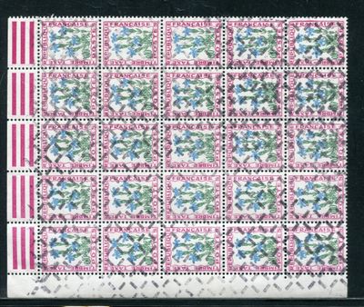 a close up of a stamp with a picture of flowers on it